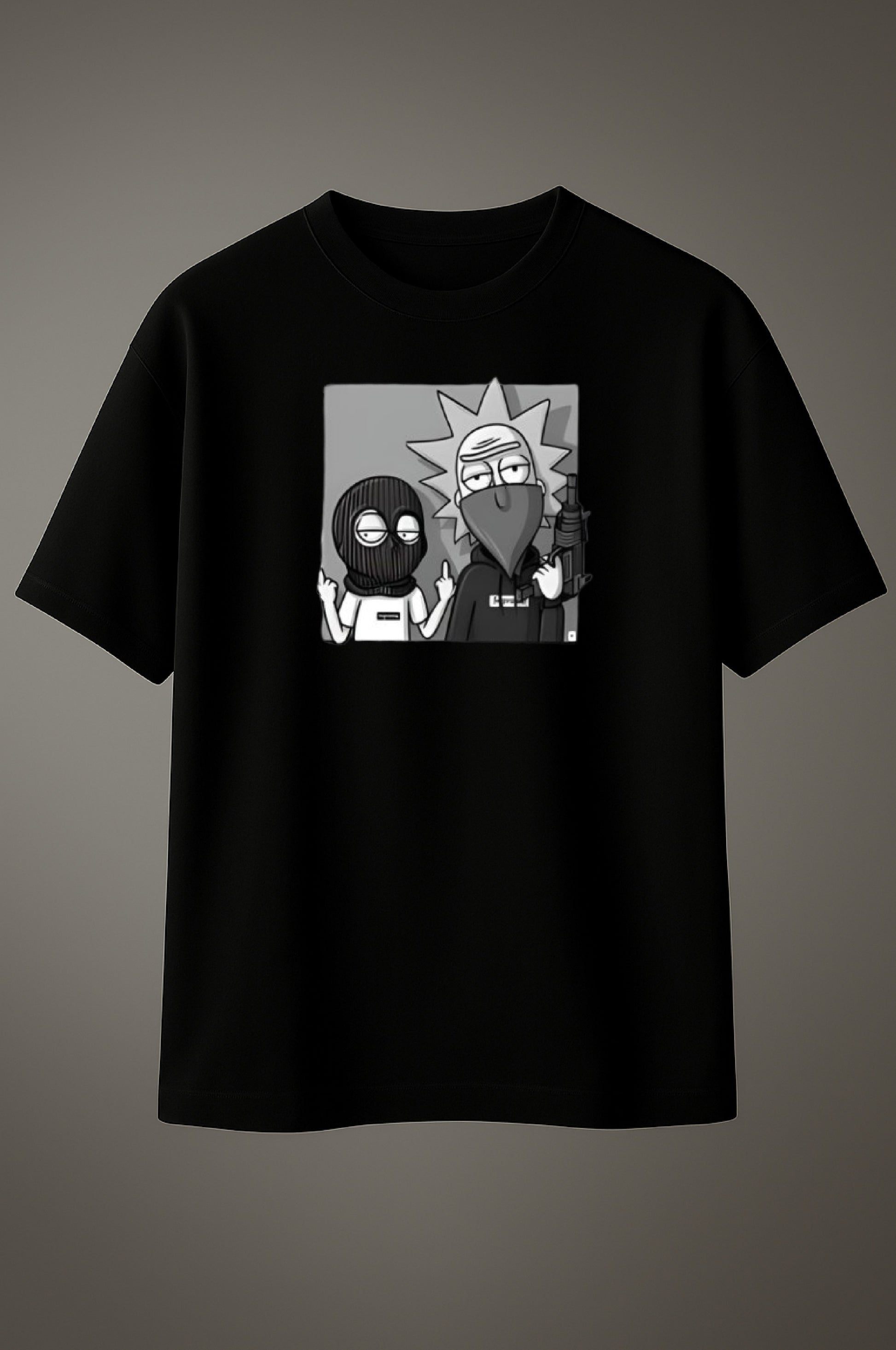Black t-shirt with cartoon graphic on a gray background