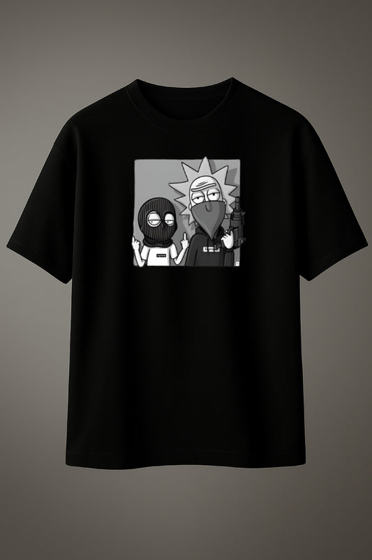 Black t-shirt with cartoon graphic on a gray background