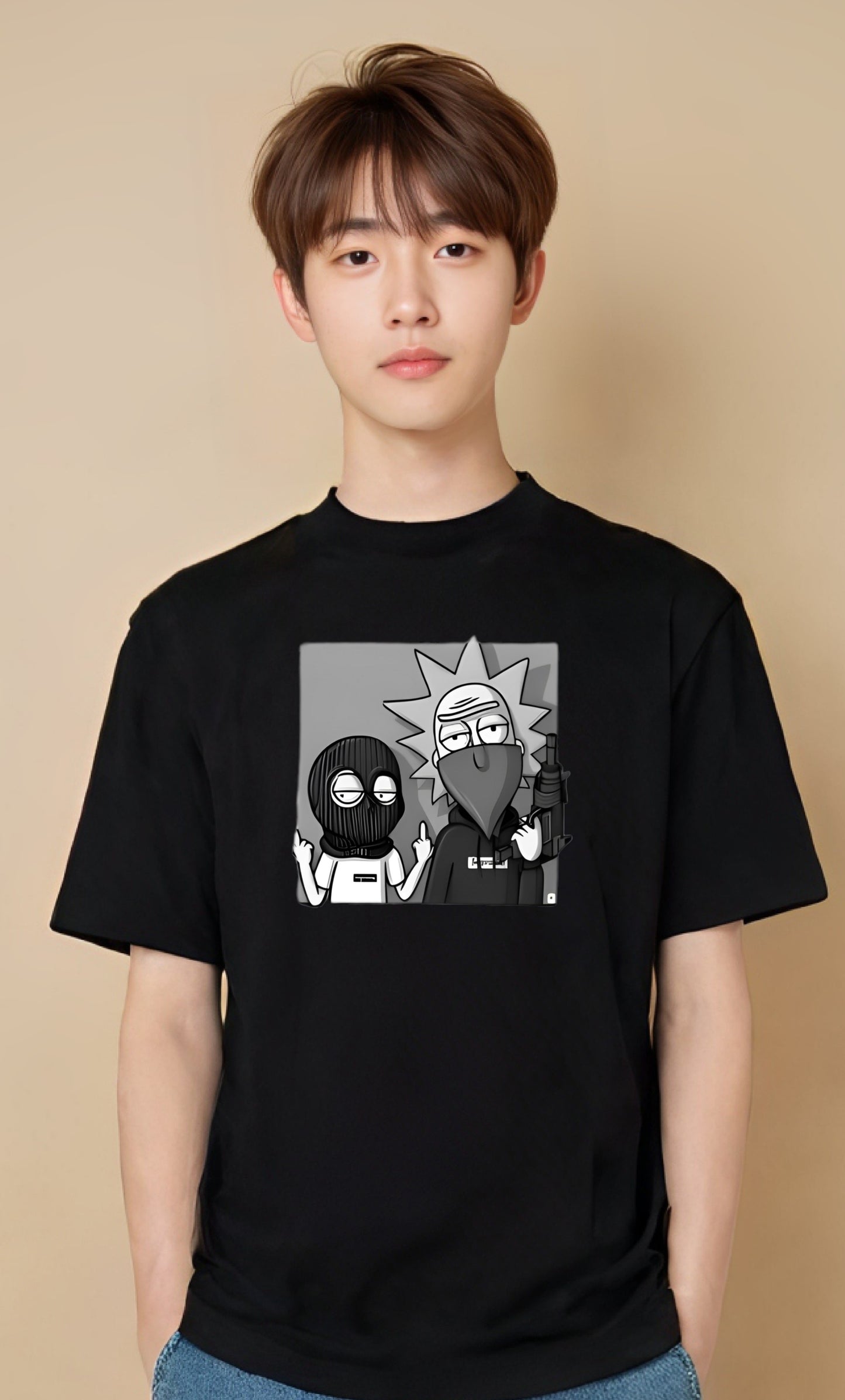 Person wearing a black t-shirt with a graphic design on a beige background