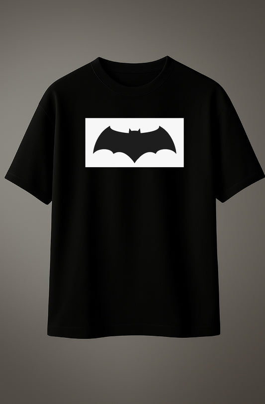 Black oversized T-shirt with Batman logo graphic printed on the chest.