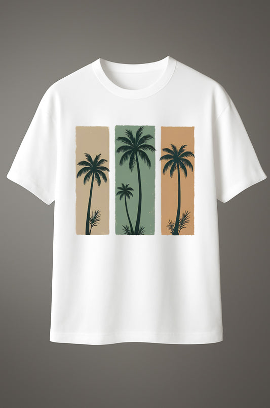White cotton T-shirt with tropical palm tree graphic print in beige, green, and orange panels.